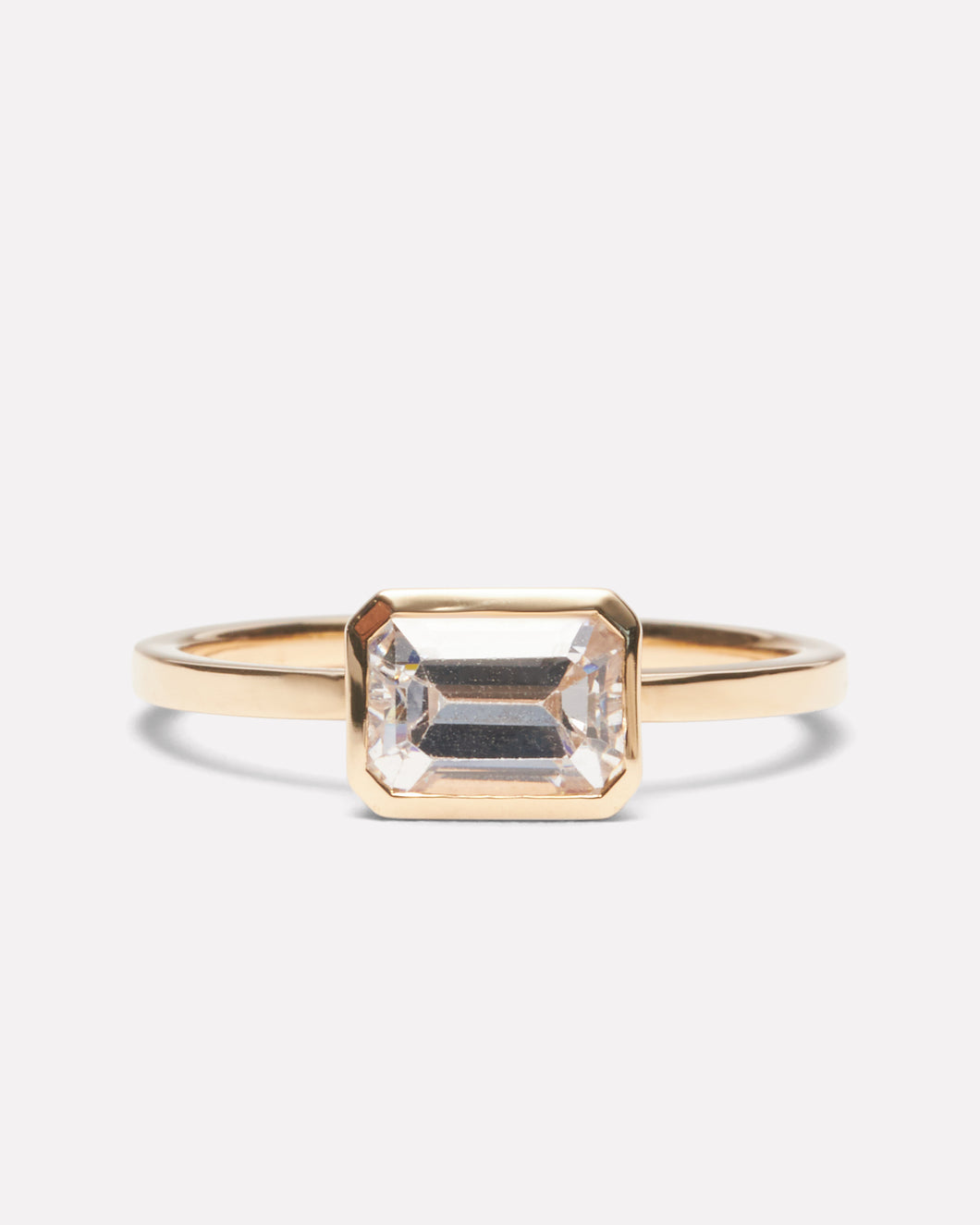 Where to buy a custom gold emerald cut diamond wedding band in Richmond va